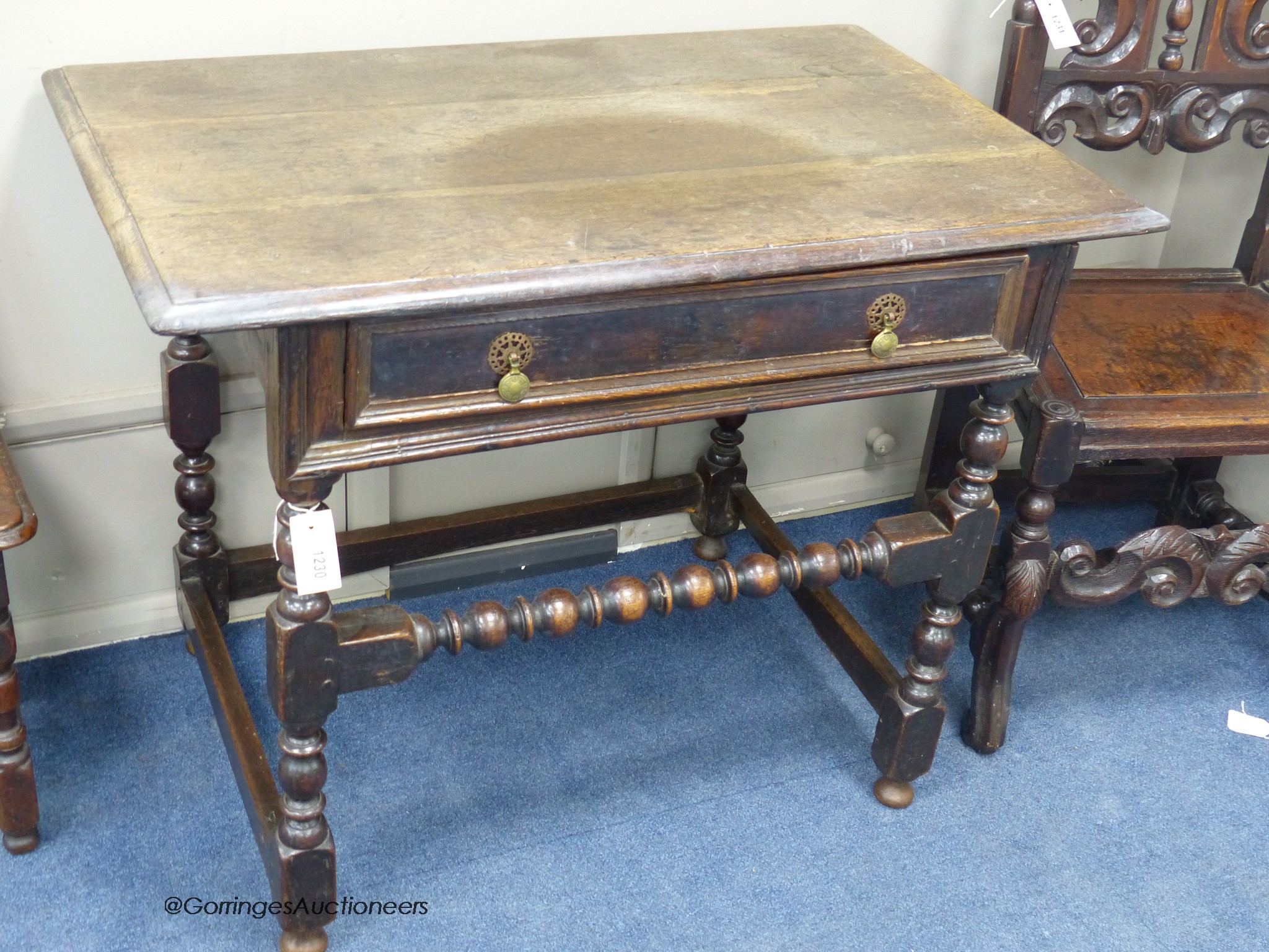 A Charles II rectangular oak side table on bobbin-turned legs and stretchers, width 95cm, depth 59cm, height 75cm